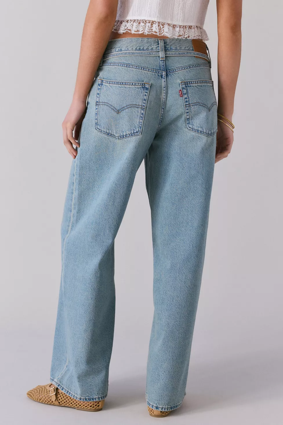 Back view of Levi's XL straight tie waist jeans in light wash denim